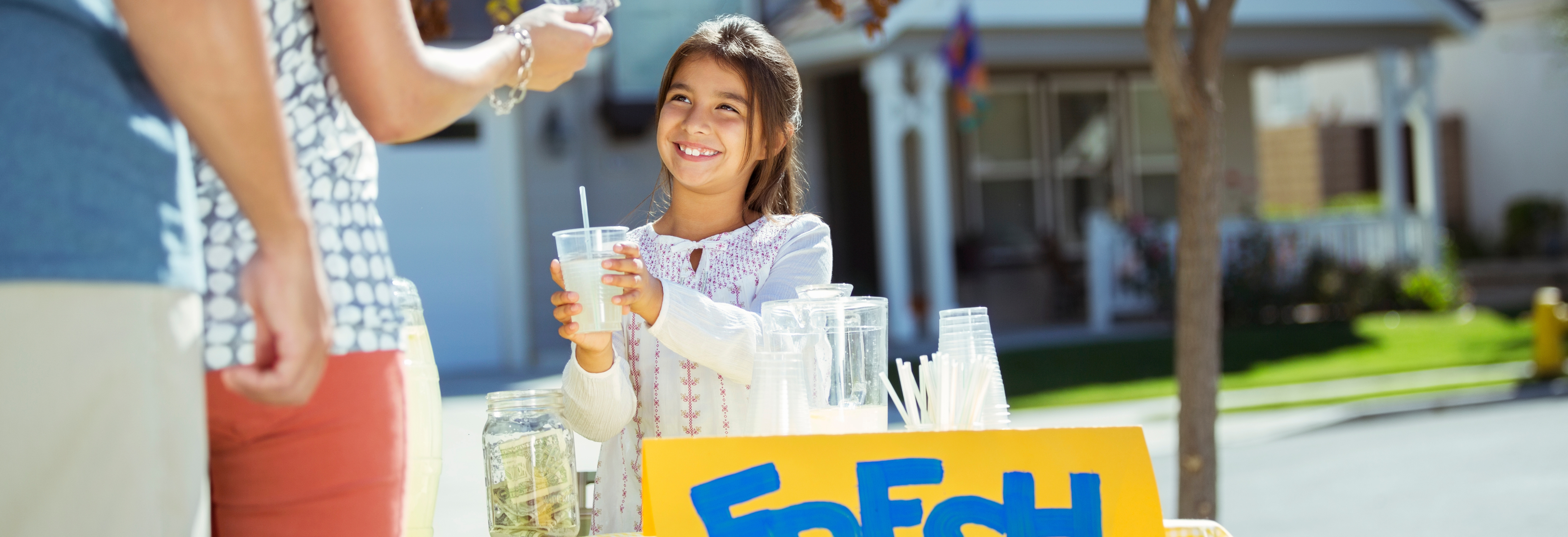 girl selling lemonade