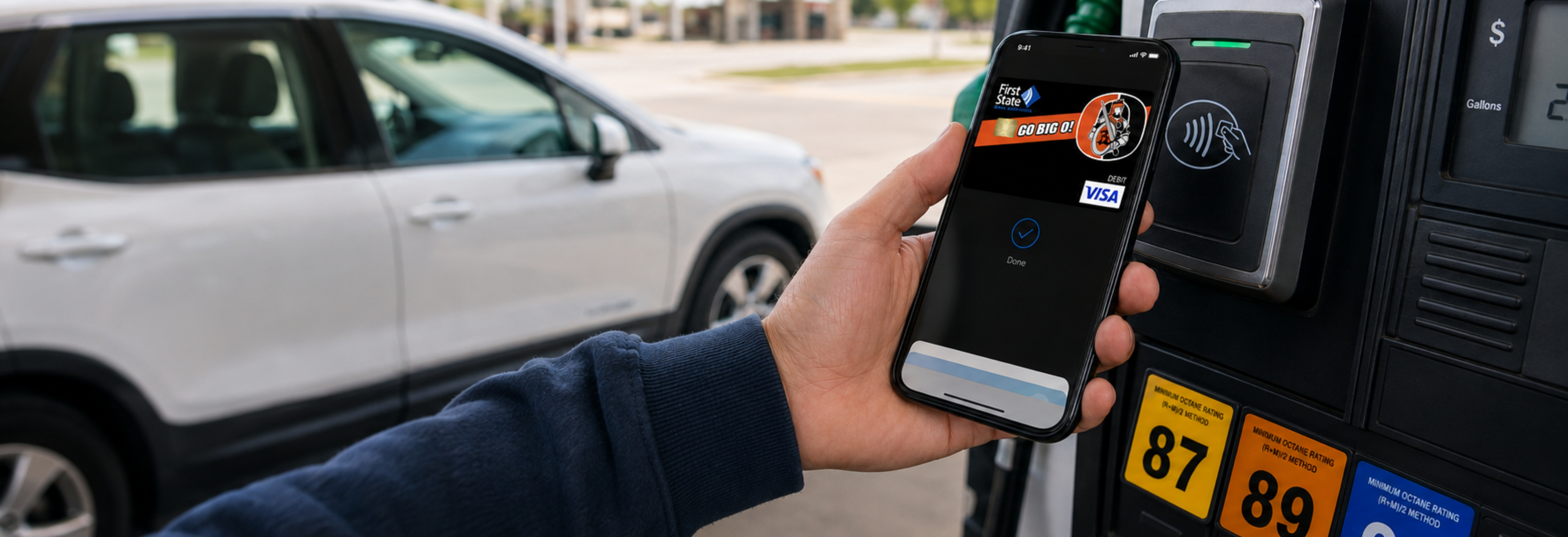 person using their mobile wallet with a Beatrice debit card at a gas pump